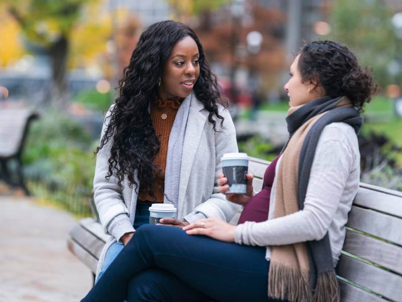 two women speaking about nursery placements